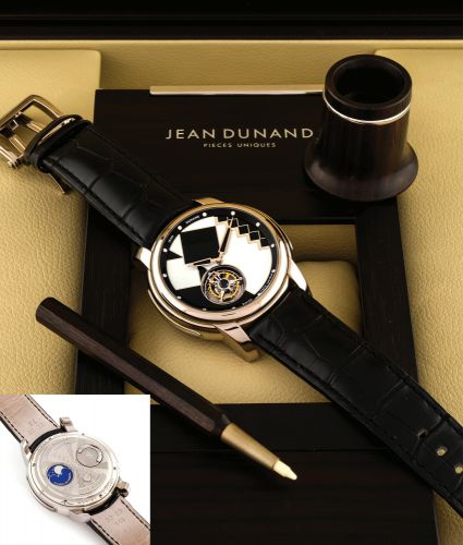 JEAN DUNAND TOURBILLON.ORBITAL PIECE UNIQUE WHITE GOLD.Jean Dunand, Tourbillon Orbital, No. IO1961..Made circa 2009..Unique 18K white gold wristwatch with revolving.one-minute flying tourbillon, reverse moon phase indication.and back-wind and an 18K white