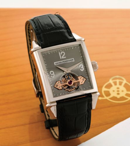 GIRARD-PERREGAUX VINTAGE TOURBILLON.SOUS UN PONT D'OR WHITE GOLD.Girard-Perregaux, No. 14 OG, Ref. 9985. Made circa 2000..Very fine and rare, large, rectangular curved, self-winding, 18K.white gold wristwatch with visible one-minute tourbillon regulator.u