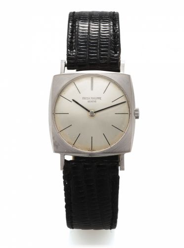 PATEK PHILIPPE REF. 3523 WHITE GOLD.Patek Philippe Co., Genève, No. 1171940, case No. 2659585.Ref. 3523. Made circa 1970s..Fine and rare, cushion-shaped, flat, 18K white gold wristwatch.