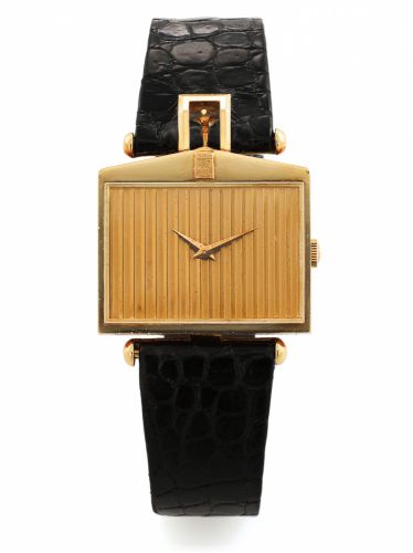 CORUM SPIRIT OF ECSTASY.MADE FOR ROLLS ROYCE YELLOW GOLD.Corum Spirit of Ecstasy, Rolls Royce. Made in the 1980s..Fine and unusual 18K yellow gold wristwatch with gold.plated Corum buckle.