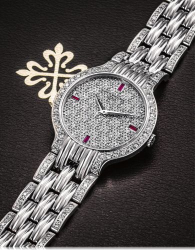 PATEK PHILIPE REF, 3965/1 WHITE GOLD AND.DIAMOND.Patek Philippe Cie, Genève, No. 1816376, Ref. 3965/1. Made circa 1980's..Fine, 18K white gold and diamond wristwatch with an 18K white gold Patek Philippe.bracelet with diamond. Acconpanied by a certifica