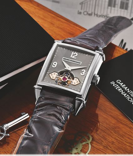 GIRARD-PERREGAUX REF. 9985 VINTAGE TOURBILLON SOUS UN PONT D'OR WHITE GOLD.Girard-Perregaux, No. 31 OG, Ref. 9985. Made circa 2000..Very fine and rare, large, rectangular curved, self-winding, 18K white gold wristwatch with visible one-minute tourbillon.r