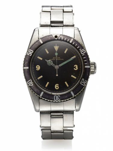 ROLEX REF 6200 EXPLORER DIAL STEEL.Rolex, Oyster Perpetual, No. 32094, Ref. 6200. Made circa 1954..Fine and very rare, center seconds, self-winding, water-resistant, stainless steel diver's.wristwatch with bidirectional revolving black bezel, large 8 mm.w