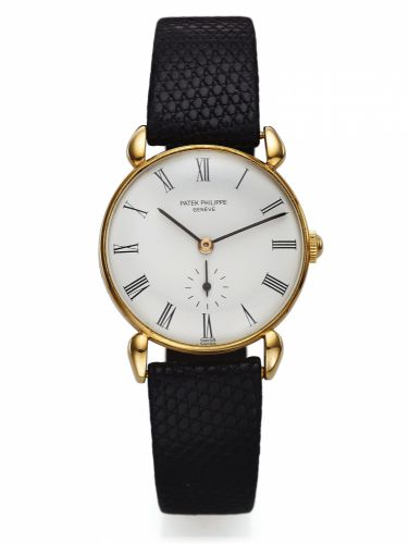 PATEK PHILIPPE REF. 590 CLAW LUGS YELLOW GOLD.Patek Philippe Cie, Genève, No. 901522, case No. 636166.Ref. 590. Made circa 1944..Very fine and rare, 18K yellow gold wristwatch with an 18K.yellow gold Patek Philippe buckle. Accompanied by a fitted box.