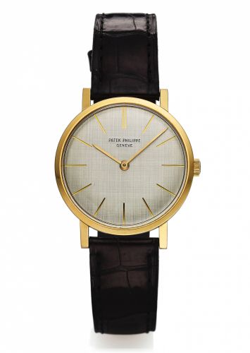 PATEK PHILIPPE REF. 3426 YELLOW GOLD.Patek Philippe, Genève, No. 791003, case No. 2627396, Ref. 3426..Made circa 1963..Fine and rare, thin, manual winding, 18K yellow gold wristwatch with an 18K yellow gold Patek Philippe buckle. Accompanied by an.18K yel