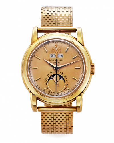 PATEK PHILIPPE REF. 2438 PERPETUAL CALENDAR YELLOW GOLD.Patek Philippe, Genève, No. 888171, case No. 2619210, Ref. 2438-1. Made in 1955, sold on th 1963..Extremely fine and extremely rare, elegant, astronomic, center seconds, water-resistant, hand.winding