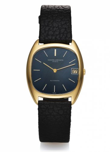 VACHERON CONSTANTIN.REF. 2020 YELLOW GOLD.Vacheron Constantin, Genève, Automatic, No. 621704.case No. 466544, Ref. 2020 Q. Made circa 1980..Fine and rare, elegant, tonneau-shaped, self-winding.18K yellow gold wristwatch with date and a gold-plated.Vac