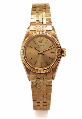 ROLEX, REF. 6619 LADY'S YELLOW GOLD.Rolex, Oyster Perpetual, case No. 2074224, Ref. 6619. Made in 1968..Fine, center seconds, self-winding, water-resistant, 14K yellow gold.lady's wristwatch with a 14K yellow gold textured Rolex bracelet.and deployant cla