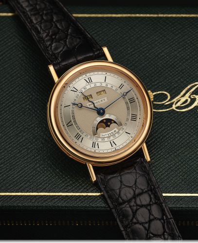 BREGUET REF. 3040 SERPENTINE TRIPLE DATE PINK GOLD.Breguet, Serpentine, No. 1158, movement No. 3691, Ref. 3040. Made in 1990, sold June 4th, 1991..Very fine, astronomic, self-winding, 18K pink gold wristwatch with triple date, moon phases, age of.the moon