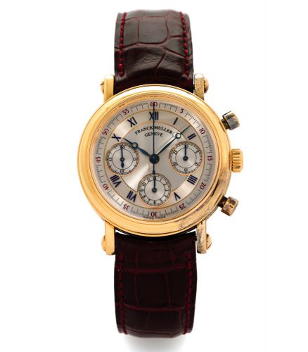 FRANCK MULLER GOLD CHRONOGRAPH.Franck Muller, Chronographe, No. 06, Ref. 7200 CO. Made in the 1990s..Fine 18K yellow gold wristwatch with round button chronograph, register.and an 18K yellow gold Franck Muller buckle.