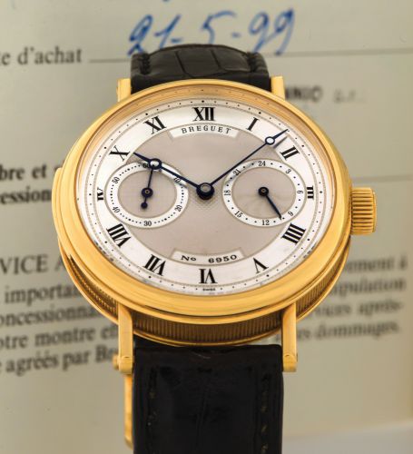 BREGUET REF. 3637 - MINUTE REPEATER.Breguet, movement No. 3173, No. 6950, Ref. 3637. Sold on May 21, 1999..Very fine and rare, minute-repeating, 18K yellow gold wristwatch with 24-hour indication.and an 18K yellow gold Breguet buckle. Accompanied by the g