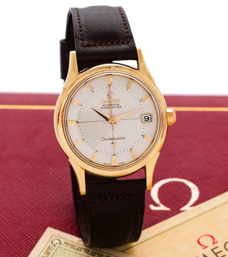 OMEGA YELLOW GOLD CONSTELLATION.CALENDAR ORIGINAL BOX PAPERS.Omega, Automatic, Chronometer, Constellation, movement.No. 17603224, Ref. 14393. Sold on February 10, 1962..Fine, center seconds, self-winding, water resistant, 18K yellow.gold Chronometer wri