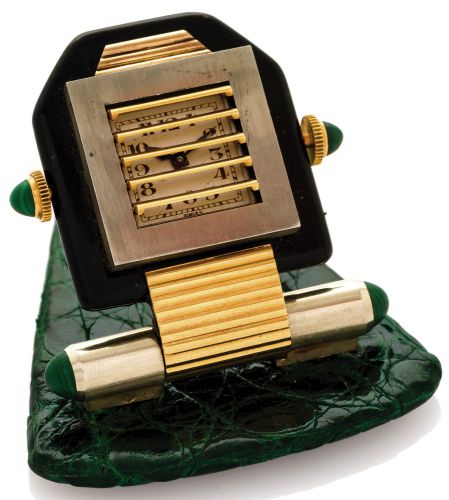 VERGER ART DECO SHUTTER WATCH.Verger, France, movement by Cyma Watch Co., Montre à Volets.movement No. B100038, case No. 1347. Made in the 1930s..Fine and unusual, 18K white and yellow gold, black lacquered.and malachite-set Art-Deco handbag buckle incorp