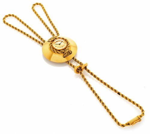 MELLERIO/CORUM YELLOW GOLD.LADY'S FINGER BRACELET WATCH.Mellerio (Paris), case No. 1846M, the movement by Corum, No. 81122..Made in the 1960s..Fine and elegant, 18K yellow gold lady's finger-worn wristwatch with.integral 18K yellow gold rope bracelet..Mov