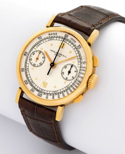 PATEK PHILIPPE REF 591 CHRONOGRAPH.Patek Philippe Co, Genève, movement No. 862470, case No. 621704, Ref. 591. Made in 1940 and sold.on November 4th, 1940..Very fine and rare 18K yellow gold wristwatch with square button chronograph, register, tachometer