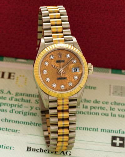 ROLEX REF. 69179 LADY DATEJUST TRIDOR.Rolex, Oyster Perpetual Datejust - Tridor, Superlative Chronometer Officially Certified, W550750, Ref. 69179. Sold on December 5th.2000..Very fine and extremely rare, tonneau shaped, center seconds.self-winding, water