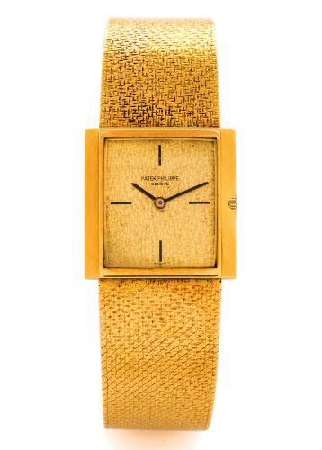 PATEK PHILIPPE REF. 3491 YELLOW GOLD.Patek Philippe, Genève, Ellipse, No. 1223801, case No..2734871, Ref. 3648 1. Made circa 1974. Very fine, oval, 18K.white gold wristwatch with an integrated 18K white gold.Patek Philippe bracelet..Dial, case and movemen