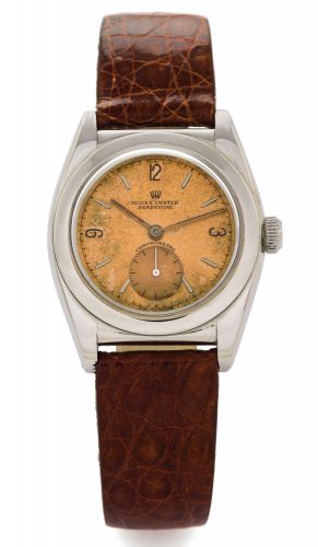 ROLEX, REF. 3133 - STEEL BUBBLE BACK.Rolex, Oyster Perpetual, Chronomètre case No. 301370.Ref. 3133. Made in 1944..Fine, tonneau-shaped, self-winding, water-resistant.stainless steel wristwatch with a stainless steel Rolex.buckle..Dial, case and movement 