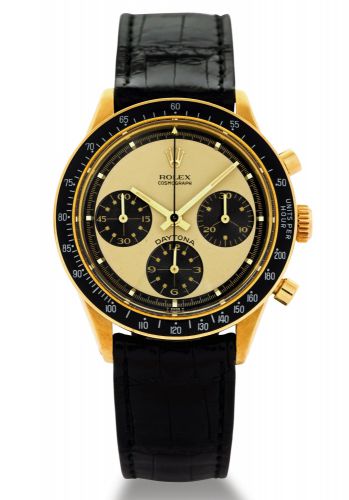 ROLEX 6264 DAYTONA PAUL NEWMAN.Rolex, Cosmograph, Daytona, case No. 2357353, Ref. 6264/6241. Made circa 1967..Very rare and fine, water-resistant, 18K yellow gold wristwatch with round button chronograph.registers, anti-reflective black bezel with tachome