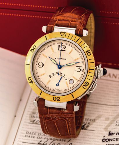 CARTIER REF. 1033 PASHA POWER RESERVE.STEEL GOLD.Cartier, Pasha Power Reserve, No. CC49942, Ref. 1033..Sold in April 2002..Fine, center seconds, self-winding, water resistant to 330.ft/100 m, stainless steel and 18K yellow gold wristwatch with 45 hour p