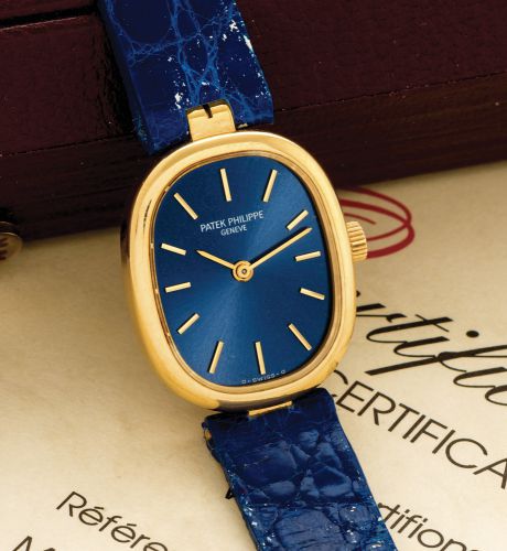 PATEK PHILIPPE REF. 4564 LADY ELLIPSE.ORIGINAL BOX CERTIFICATE YELLOW GOLD.Patek Philippe, Geneve, Ellipse, case No. 2906226, movement.No. 1414705, Ref. 4564. Sold on October 14, 1991..Fine and elegant, oval, 18K yellow gold lady's wristwatch with an 18