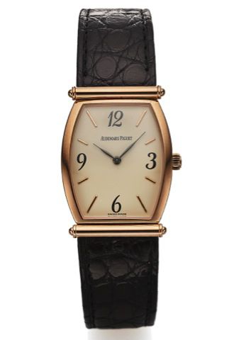 AUDEMARS PIGUET CARNEGIE PINK GOLD.Audemars Piguet, Genève, Carnegie, case No. D 69381, Ref. 14941. Made in the 1990s..Very fine, tonneau-shaped, 18K pink gold wristwatch with an.18k pink gold Audemars Piguet buckle. Accompanied by a.service pouch and ser