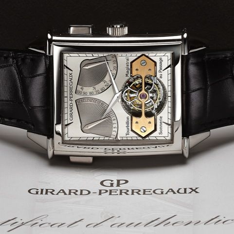 GIRARD-PERREGAUX VINTAGE 1945 XXL TOURBILLON MAGISTRAL SONNERIE AU PASSAGE PLATINUM.Girard-Perregaux, No. 7, Ref. 9971. Made in 2006..Very fine and rare, large, rectangular curved, manual winding, Platinum wristwatch with visible one-minute tourbillon.reg
