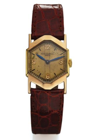 PATEK PHILIPPE REF. 472 OCTAGONAL PINK GOLD.Patek Philippe Co, Geneve, movement No. 813903, case No..613200, Ref. 472. Movement made in 1926, encased in 1936 and.sold on January 13th, 1937..Very fine and rare, octagonal 18K pink gold wristwatch with.a 1