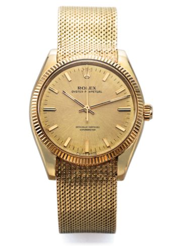 ROLEX REF. 6567 YELLOW GOLD.Rolex, Oyster Perpetual, Superlative Chronometer.Officially Certified, case No. llegible, Ref. 6567. Made.circa 1959..Fine, center seconds, self-winding, water-resistant, 18K.yellow gold wristwatch with not original 18K yellow 