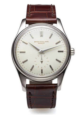 PATEK PHILIPPE REF 3428 ENAMEL DIAL WHITE GOLD.Patek Philippe, Genève, No. 1112124, case No. 2626423, Ref. 3428. Sold on 19th July 1962..Very fine and rare, water-resistant, self-winding, 18K white gold wristwatch with enamel dial.and an 18K white gold Pa
