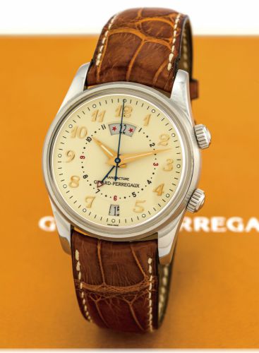 GIRARD-PERREGAUX TRAVELLER II STAINLESS STEEL.Girard-Perregaux, Traveller II Time Zone - Alarm Automatic, No..2222, Ref. 4940. Made in the 2000s..Fine, two time zone, self-winding, water-resistant, stainless steel.wristwatch with center-seconds, 24-hour i