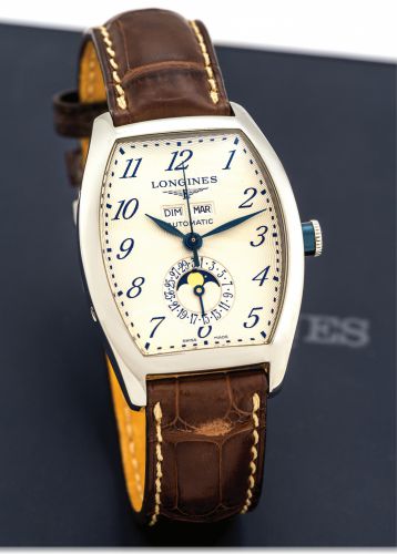 LONGINES EVIDENZA TRIPLE DATE MOONPHASE, STEEL.Longines, Evidenza, Automatic, case No. 32550140. Made circa.2005..Fine, tonneau shaped, large, water resistant, self-winding.stainless steel wristwatch with day, date, month and moonphases..Accompanied by a 