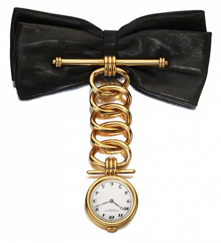 PATEK PHILIPPE REF. 4762.LEATHER BOW YELLOW GOLD.Patek Philippe Co., Genève, No. 1607226, case No. 2870537.Ref. 4762. Made in a limited edition of 50 pieces for the 150th.Anniversary of Patek Philippe in 1989..Very fine and unusual, 18K yellow gold and 