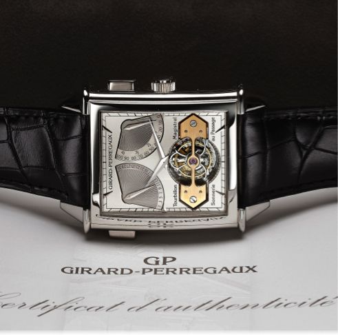 GIRARD-PERREGAUX VINTAGE 1945 XXL TOURBILLON MAGISTRAL SONNERIE AU PASSAGE PLATINUM.Girard-Perregaux, No. 7, Ref. 9971. Made in 2006..Very fine and rare, large, rectangular curved, manual winding, Platinum wristwatch with visible one-minute tourbillon.reg