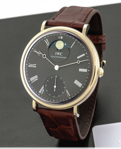 IWC PORTOFINO HAND WOUND.OVERSIZED WHITE GOLD.International Watch Co., (IWC), Schaffhausen, Portofino.Hand-Wound, movement No. 3183727, case No. 33360739.Ref. IW544804. Made circa 2011..Very fine, large, 18K white gold wristwatch with moon phases.and a 