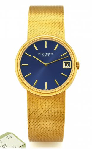 PATEK REF. 3601 AUTOMATIC BLUE DIAL YELLOW GOLD.Patek Philippe, Genève, No. 1300899, Ref. 3601/101. Made in the 1980s..Fine, self-winding, thin, 18K yellow gold gentleman's wristwatch with date.and an 18K yellow gold integrated and textured Patek Philip