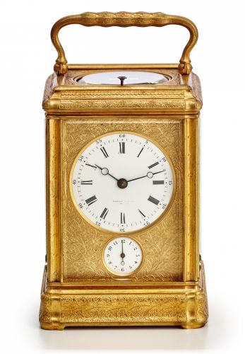 DROCOURT GRANDE PETITE SONNERIE.CARRIAGE CLOCK RETAILED BY TIFFANY.Drocourt, No. 8741, retailed by Tiffany Co., New York. Made.circa 1890..Very fine, engraved gilt brass, grande and petite sonnerie.striking and repeating, 8 day-going carriage clock wi