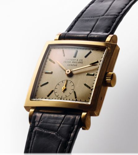 PATEK PHILIPPE REF. 1431 RETAILED BY TIFFANY YELLOW GOLD.Patek Philippe Co, Genève, No.955855, case No. 664918, Ref. 1431. Sold on July 24th, 1951..Fine, square, 18K yellow gold wristwatch with an 18K yellow gold Patek Philippe buckle..Accompanied by an