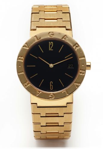 BULGARI REF. BB 33 GGD QUARTZ YELLOW GOLD.Bulgari, case No. F161021, Ref. BB 33 GGD. Made in the 1990s..Fine, water-resistant, 18K yellow gold mid size quartz.wristwatch with date and an integrated 18K yellow gold.Bulgari link bracelet with deployant clas