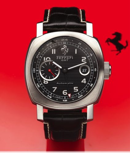 FERRARI REF. F 6655, FER00003 GMT.ENGINEERED BY PANERAI STEEL.Ferrari GMT, Automatic, F B097 / 500, case No. BB 1231680, Ref. F.6655. Made in a limited edition of 500 pieces in 2007..Fine, large, cushion-shaped, self-winding, water-resistant, two.time zon