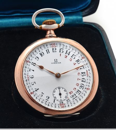 OMEGA COMPASS 24 HOUR DAY AND NIGHT DIAL.Omega, Compass Lépine, movement No. 6652549, case No..7158847, ref. GS 141 LT. Made circa 1927..Fine and very unusual, silver and pink gold capped, keyless.pocket watch with 24-hour day and night dial with points.o