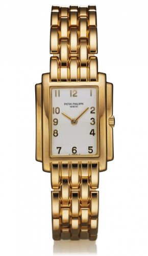 PATEK REF. 4824 GONDOLO.QUARTZ YELLOW GOLD.Patek Philippe Cie, Genève, Gondolo, No. 1628793.case No. 2988664, Ref. 4824-1. Made in the 1990s..Very fine, rectangular curved, water-resistant, 18K yellow.gold midsize quartz wristwatch with an integral 18k.