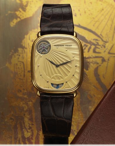 AUDEMARS PIGUET WORLD'S SMALLEST TOURBILLON AUTOMATIC YELLOW GOLD.Audemars Piguet, Tourbillon Automatique, No. 93. Made circa 1990..Very fine and elegant, rectangular, thin, self-winding, 18K yellow gold wristwatch with visible one-minute.tourbillon regul