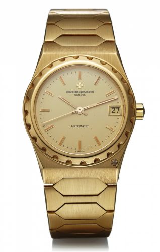 VACHERON CONSTANTIN 222.AUTOMATIC YELLOW GOLD.Vacheron Constantin, Genève, 222, case No. 554016.Ref. 60001. Made in the 1980s..Fine, tonneau-shaped, self-winding, water-resistant, 18K.yellow gold wristwatch with date and an 18K yellow gold.integrated li