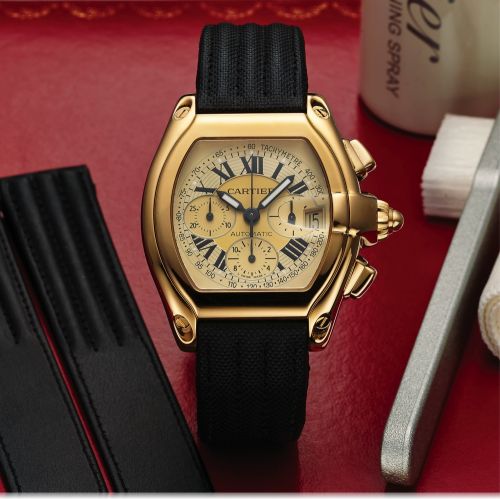 CARTIER REF. 2619 ROADSTER.AUTOMATIC CHRONOGRAPH YELLOW GOLD.Cartier, Roadster Chronograph, Automatic, case No. 108851 LX.Ref. 2619. Sold October 3rd, 2000..Fine, large, tonneau-shaped, curved, self-winding, water resistant.to 100 m, 18K yellow gold wrist