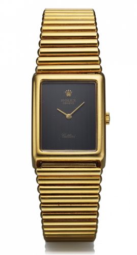 ROLEX CELLINI REF. 4103.BLACK DIAL YELLOW GOLD.Rolex, Cellini, case No. 4272641, Ref. 4103..Made in the 1980s..Fine and elegant, rectangular, thin, 18K yellow gold.wristwatch with an 18K yellow gold tubular bracelet.