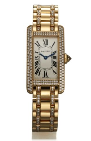 CARTIER REF. 2482 LADY'S TANK.AMERICAINE YELLOW GOLD.DIAMONDS.Cartier, Tank Américaine, case No. 266619CE.Ref. 2482. Made in the 2000s..Fine, water-resistant, rectangular-curved, 18K yellow gold.and diamond lady's quartz wristwatch with an 18K yellow.gold