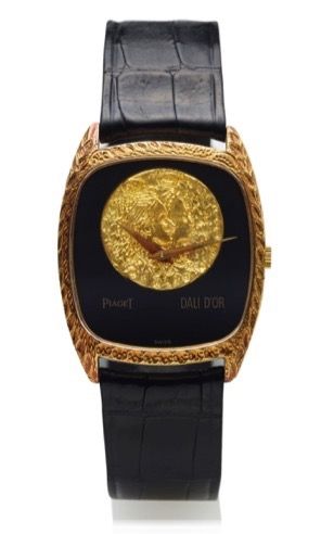 PIAGET REF. 9591 DALI D'OR LIMITED.EDITION YELLOW GOLD.Piaget, ''Dali D'or'', case 390025, Ref. 9591. Made in.a limited edition of 200 pieces in 1980..Fine, rare and elegant, tonneau shaped, 18K yellow.gold wristwatch with an 18K yellow gold Piaget.buckle