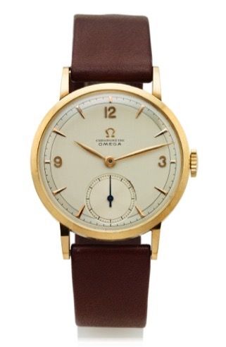 OMEGA CHRONOMETER YELLOW GOLD.Omega, Chronomètre, No. 10646590, case No..1076900. Made in the 1950's..Fine and rare, hand winding, 18K yellow gold.Chronometer wristwatch. Accompanied by a box..Dial, case and movement signed.