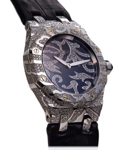 AUDEMARS PIGUET LADY ROYAL OAK LEAVES.DIAMOND AND WHITE GOLD.Audemars Piguet, Genève, Lady Royal Oak Leaves, No. 0015, case No. F53275, Ref. 67607BC.ZZ.D001SU.01. Made circa 2007..Fine and elegant, octagonal, 18K white gold and diamond set lady's quartz w